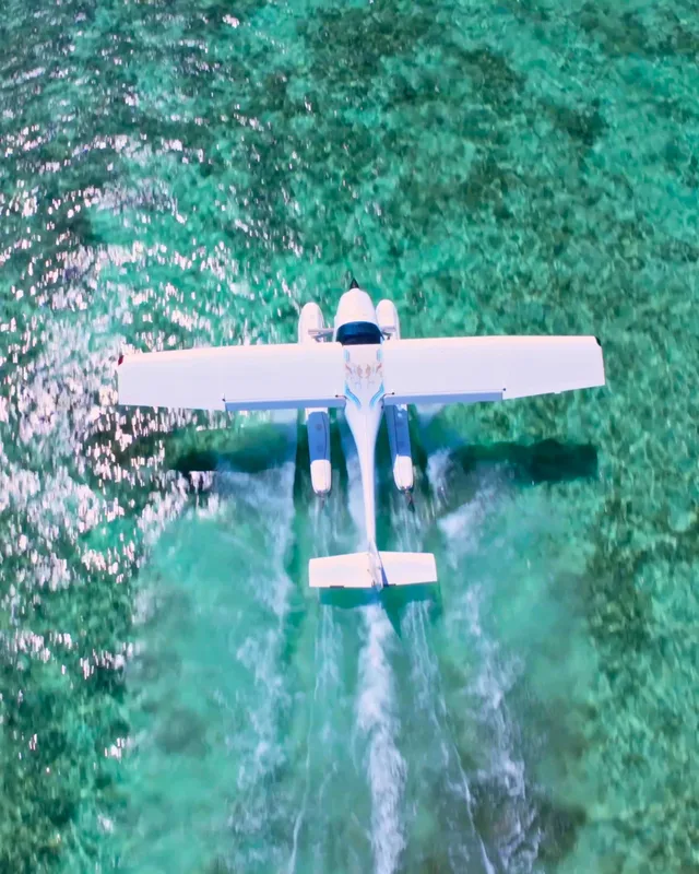 Seaplane on the turquoise East Coast lagoon, Mauritius